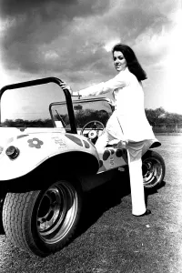 A model in a beach buggy wearing a raincoat in April 1970 A model in a beach buggy wearing a raincoat in April 1970