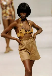 Model on the cat walk wearing a bra made from biscuits in the Red or Dead fashion show Model on the cat walk wearing a bra made from biscuits in the Red or Dead fashion show