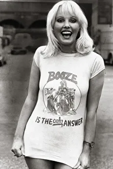 The model seems to happily support the message her T-Shirt brings across The model seems to happily support the message her T-Shirt brings across