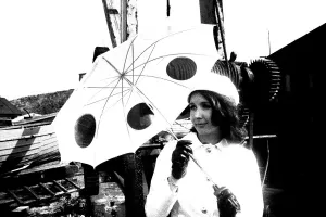 A model posing with and unbrella in April 1970 A model posing with and unbrella in April 1970