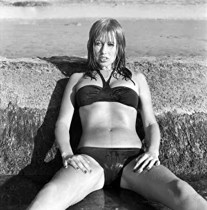 Model wearing a bikini as she poses on a beach in Africa April 1975 Model wearing a bikini as she poses on a beach in Africa April 1975