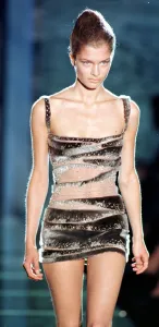 Model wearing a sparkling seal skin dress as part of Donatella Versace' Model wearing a sparkling seal skin dress as part of Donatella Versace'