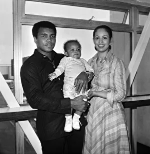 Mohammad Ali pictured with his wife Veronica and baby Hanna at Heathrow Airport today Mohammad Ali pictured with his wife Veronica and baby Hanna at Heathrow Airport today