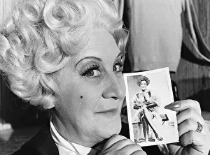 Mollie Sugden actress with a photo - July 1977 Appearing in the television Mollie Sugden actress with a photo - July 1977 Appearing in the television