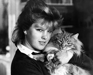 Monty the cat seen here with his owner March 1986 P005152 Monty the cat seen here with his owner March 1986 P005152