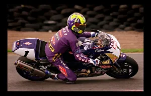 Motorcycle Racing August 1998 cyclist in purple Boost sponsored suit Motorcycle Racing August 1998 cyclist in purple Boost sponsored suit