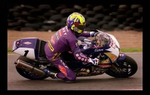 Motorcycle Racing August 1998 cyclist in purple Boost sponsored suit Motorcycle Racing August 1998 cyclist in purple Boost sponsored suit