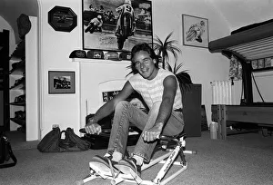 Motorcyclist Barry Sheene at home working out 1984 on rowing machine Motorcyclist Barry Sheene at home working out 1984 on rowing machine