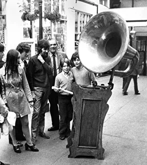 Mr. Derek Kirkup stops the people in Handiside Arcade to the rhythm of a ragtime band Mr. Derek Kirkup stops the people in Handiside Arcade to the rhythm of a ragtime band