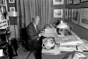 Images Dated 21st January 1975: Mr. Edward Heath at home. Mr. Edward Heath, Leader of the Opposition signing letters at