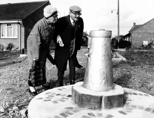 Mr and Mrs Caswell look at the Silver Jubilee Churn that was erected near Gillingham in Mr and Mrs Caswell look at the Silver Jubilee Churn that was erected near Gillingham in