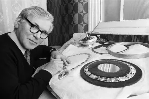 Mr Stanley Morris, a Birmingham designer and craftsman, puts the finishing touches to a Mr Stanley Morris, a Birmingham designer and craftsman, puts the finishing touches to a