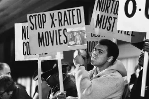 Muhammad Ali and his entourage holding anti Ken Norton banners ahead of their third fight Muhammad Ali and his entourage holding anti Ken Norton banners ahead of their third fight