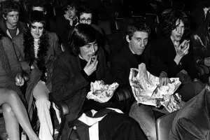 Music fans eat their fish and chips at the Sophia Gardens Pavilion in Cardiff whilst Music fans eat their fish and chips at the Sophia Gardens Pavilion in Cardiff whilst
