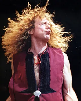 Musician Robert Plant of Led Zepplin seen here on stage.Glastonbury Festival 1995 Musician Robert Plant of Led Zepplin seen here on stage.Glastonbury Festival 1995