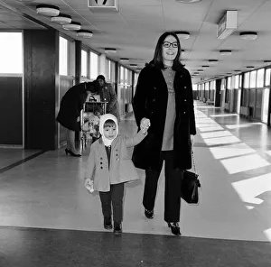 Nana Mouskouri arrives at Heathrow Airport from paris, with her son Nicky, aged 2 Nana Mouskouri arrives at Heathrow Airport from paris, with her son Nicky, aged 2