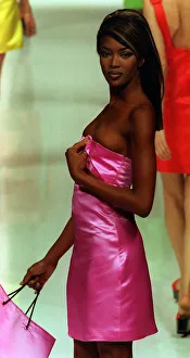 Naomi Campbell models designs by the designer Genny October 1995 Naomi Campbell models designs by the designer Genny October 1995
