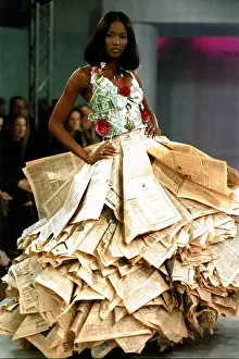 Naomi Campbell wearing a newspaper and money dress at the Clothing Brition Fashion Show Naomi Campbell wearing a newspaper and money dress at the Clothing Brition Fashion Show
