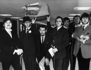 The New Vaudeville Band leaving London Airport for Los Angeles where they go to The New Vaudeville Band leaving London Airport for Los Angeles where they go to