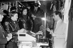 New York Police question a man in a shop. 13th February 1981 New York Police question a man in a shop. 13th February 1981
