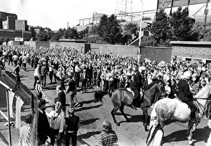 Newcastle Supporters - Police on horse back control the Newcastle supporters outside St Newcastle Supporters - Police on horse back control the Newcastle supporters outside St