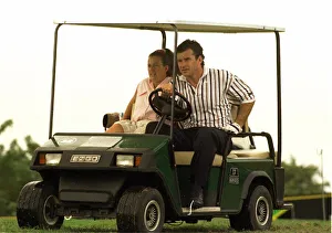 Nick Faldo gives his caddie Fanny a lift in a golf car in Jamaica Nick Faldo gives his caddie Fanny a lift in a golf car in Jamaica