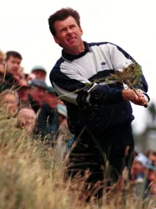 Nick Faldo hits out of the rough after a bad tee shot during the third round of the Open Nick Faldo hits out of the rough after a bad tee shot during the third round of the Open