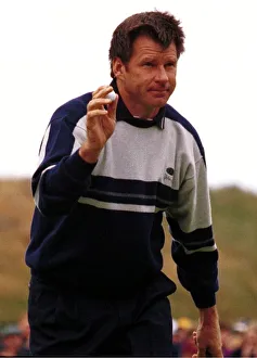 Nick Faldo manages a smile after putting the ball on the fourth hole during the third Nick Faldo manages a smile after putting the ball on the fourth hole during the third