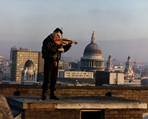Nigel Kennedy Violinist playing on Rooftop Nigel Kennedy Violinist playing on Rooftop