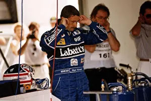 Nigel Mansell Motor Racing Driver Formula One F1 blocks his ears with his fingers while Nigel Mansell Motor Racing Driver Formula One F1 blocks his ears with his fingers while