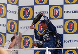 Nigel Mansell winning the British Grand Prix July 1992 Celebrating spraying other Nigel Mansell winning the British Grand Prix July 1992 Celebrating spraying other