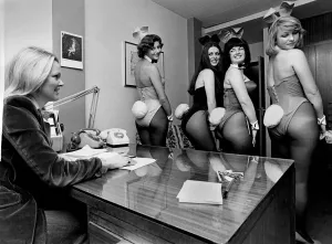 Night Clubs. Bunny Girls in the office having their tails looked at Night Clubs. Bunny Girls in the office having their tails looked at