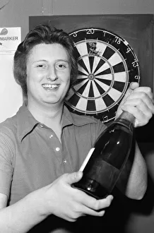 Nineteen year old Eric Bristow celebrates his victory in the Professional section of Nineteen year old Eric Bristow celebrates his victory in the Professional section of