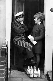 Norman Wisdom: Norman chats to Mrs. Agnes Kirwan on the doorstep. December 1972 Norman Wisdom: Norman chats to Mrs. Agnes Kirwan on the doorstep. December 1972