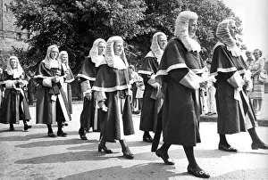 North judges walk in procession across Palace Green wearing their wigs North judges walk in procession across Palace Green wearing their wigs