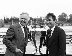Nottingham Forest manager Brian Clough with his assistant Peter Taylor celebrating Nottingham Forest manager Brian Clough with his assistant Peter Taylor celebrating