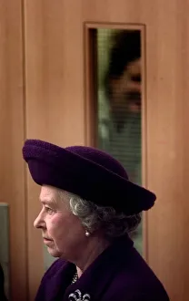 A nurse tries to get a view of the Queen during the opening of The Princess Diana A nurse tries to get a view of the Queen during the opening of The Princess Diana