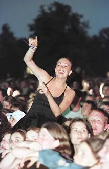 Oasis Fans enjoy themselves at their concert at Knebworth Oasis Fans enjoy themselves at their concert at Knebworth