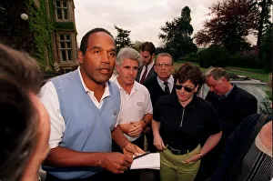 OJ Simpson signs some autographs during his game of golf OJ Simpson signs some autographs during his game of golf