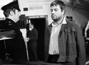 Oliver Reed British actor in film Sitting Target 1971 in jail facing prison Oliver Reed British actor in film Sitting Target 1971 in jail facing prison