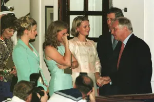 Outgoing governor of Hong Kong Chris Patten comforts memebers of his family Alice Outgoing governor of Hong Kong Chris Patten comforts memebers of his family Alice