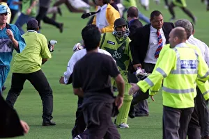 Pakistani's Saeed Amwar races off at end June 1999 with a bodyguard following Pakistani's Saeed Amwar races off at end June 1999 with a bodyguard following