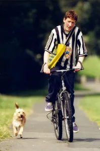 Paperboy David Stockell takes his dog on his paper round. 17th August 1998 Paperboy David Stockell takes his dog on his paper round. 17th August 1998