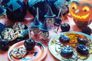 Some party food for Halloween in 1993. Some black toffee apples, spider jellies Some party food for Halloween in 1993. Some black toffee apples, spider jellies