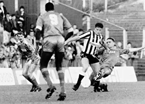 Paul Gascoigne of Newcastle United challenged for the ball by Vinnie Jones of Wimbledon Paul Gascoigne of Newcastle United challenged for the ball by Vinnie Jones of Wimbledon