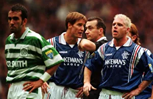 Paul Gascoigne of Rangers makes a face at Paolo di Canio of Celtic with Richard Gough Paul Gascoigne of Rangers makes a face at Paolo di Canio of Celtic with Richard Gough