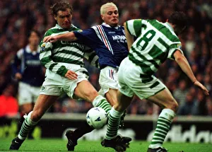Paul Gascoigne of Rangers is tackled by Peter Grant of Celtic in the Scottish Premier Paul Gascoigne of Rangers is tackled by Peter Grant of Celtic in the Scottish Premier