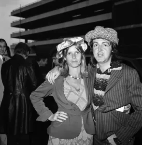 Paul McCartney seen here with his wife Linda at Heathrow Airport. April 1975 75-1772-002 Paul McCartney seen here with his wife Linda at Heathrow Airport. April 1975 75-1772-002