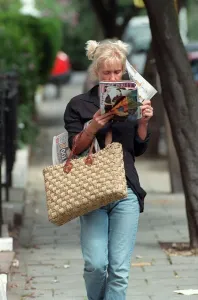 Paula Yates TV Presenter August 1998 Walking down the street reading a magazine Paula Yates TV Presenter August 1998 Walking down the street reading a magazine