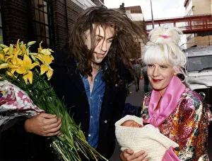 Paula Yates TV Presenter with new baby and husband leaving hospital Paula Yates TV Presenter with new baby and husband leaving hospital